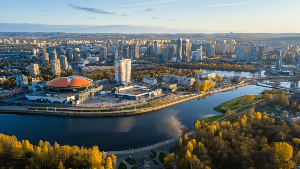 парки, река и высокие здания